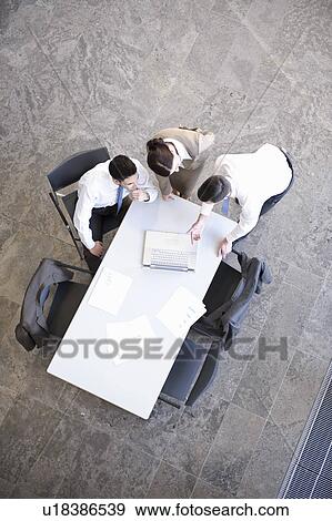 Presentation with young business team View Large Photo Image Stock Photo - Presentation with young business team. Fotosearch