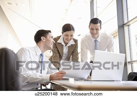 Presentation with young business team View Large Photo Image Stock Photo - Presentation with young business team. Fotosearch