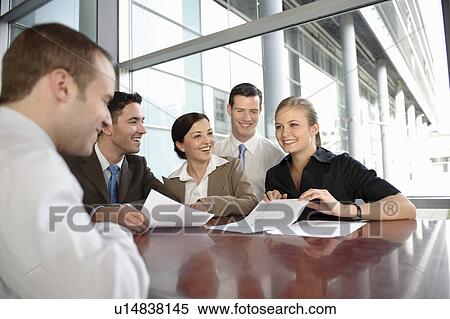 Presentation with young business team View Large Photo Image Stock Photography - Presentation with young business team. Fotosearch