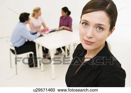 Professional women looks to camera View Large Photo Image Stock Image - Professional women looks to camera. Fotosearch