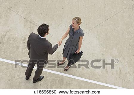 Stock Image - Putting through a deal. Fotosearch