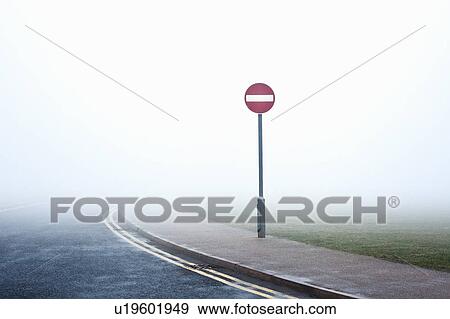 Road with no entry sign in fog View Large Photo Image Stock Photo - Road with no entry sign in fog. Fotosearch