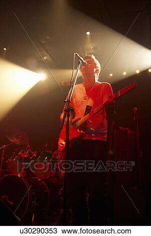 Stock Image - Rock band guitarist. Fotosearch
