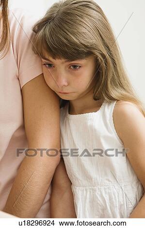 Picture - Sad little girl. Fotosearch