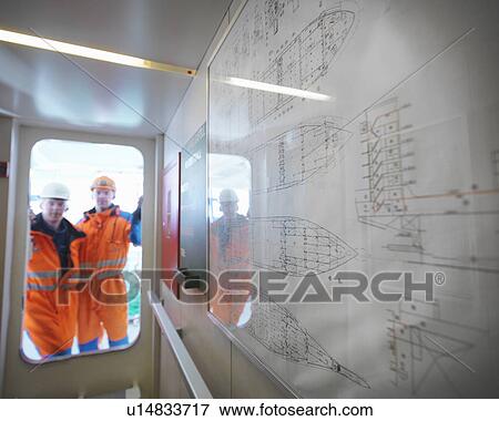 Stock Photo - Sailors looking through doorway on deck. Fotosearch