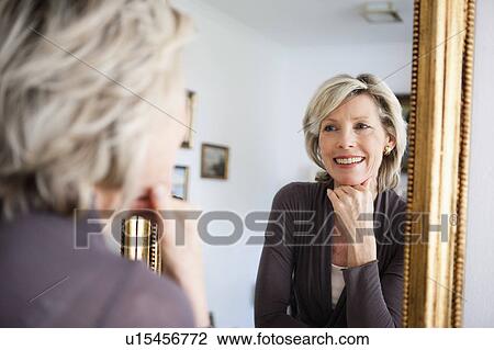 Senior Lady Looking at Mirror View Large Photo Image Stock Image - Senior Lady Looking at Mirror. Fotosearch