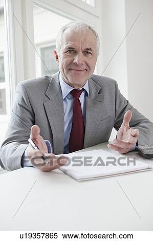 Senior man looking at camera View Large Photo Image Stock Photography - Senior man looking at camera. Fotosearch