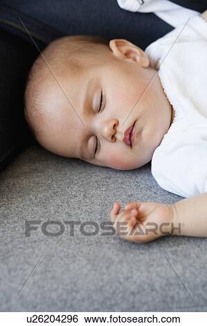 Sleeping baby View Large Photo Image Stock Photograph - Sleeping baby. Fotosearch