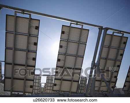 Stock Image - Solar power station showing panel's back. Fotosearch