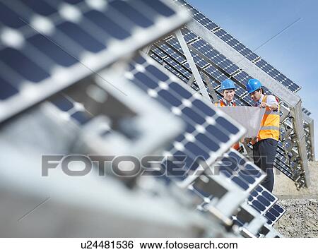 Spanish solar power station with workers View Large Photo Image Stock Photograph - Spanish solar power station with workers. Fotosearch