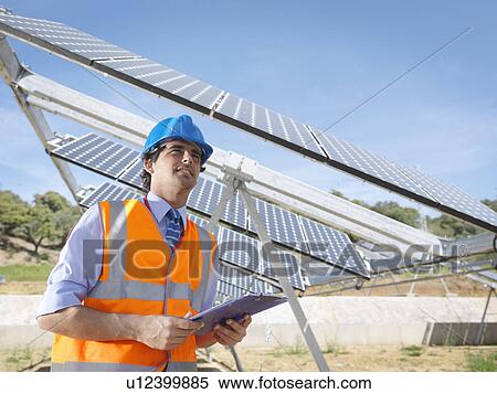 Spanish solar power station with workers View Large Photo Image Stock Photography - Spanish solar power station with workers. Fotosearch