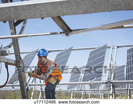 Stock Photography - Spanish solar power station with workers. Fotosearch