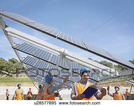 Stock Photography - Spanish solar power station with workers. Fotosearch