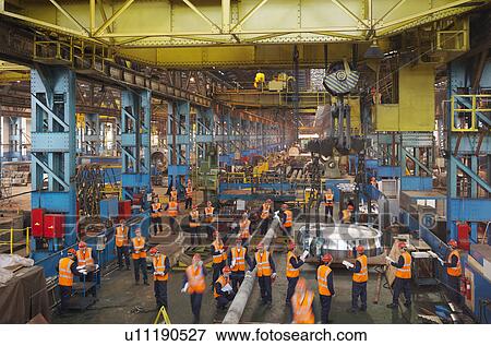 Stock Photo - Steel Engineers Working In Plant. Fotosearch