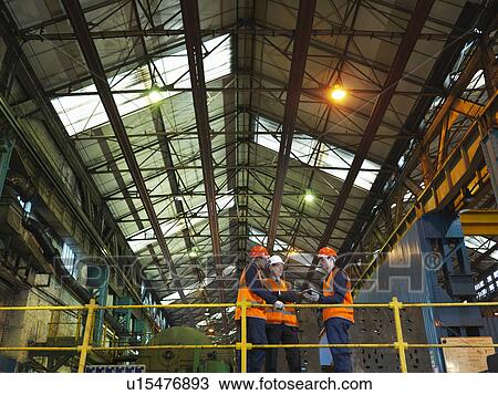 Steel Workers And Engineer In Factory View Large Photo Image Stock Image - Steel Workers And Engineer In Factory. Fotosearch