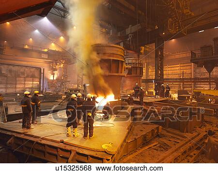 Stock Photo - Steel Workers In Plant Working On Ladle. Fotosearch