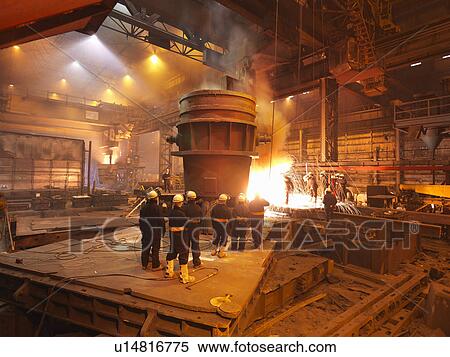 Stock Photography - Steel Workers With Ladel And Sparks. Fotosearch