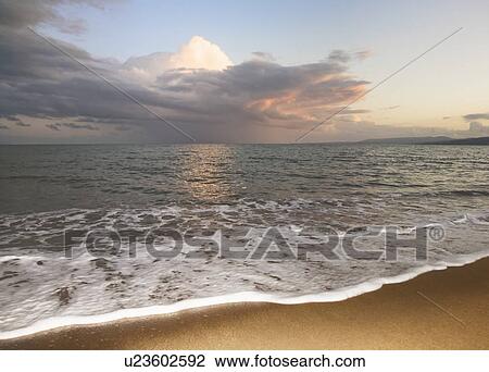 Sunset from a beach View Large Photo Image Stock Image - Sunset from a beach. Fotosearch