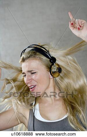 Stock Photo - Teen dance with headphones. Fotosearch