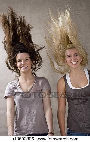 Teen girls laughing together View Large Photo Image Stock Photography - Teen girls laughing together. Fotosearch