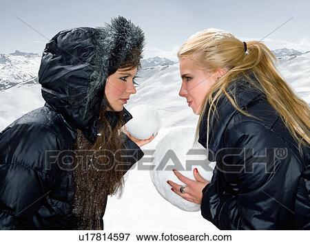 Teen girls snowball fight View Large Photo Image Stock Photo - Teen girls snowball fight. Fotosearch