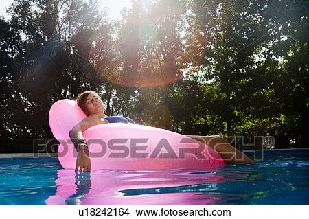 Picture - Teen in a pool. Fotosearch