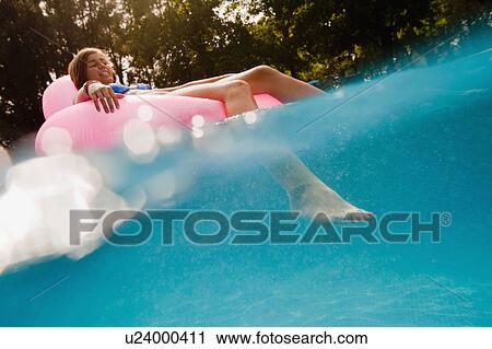 Stock Image - Teen in a pool. Fotosearch