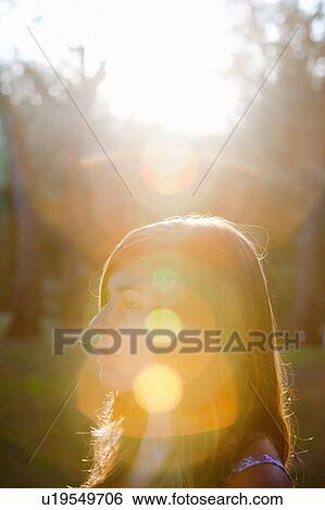 Teen in sunset View Large Photo Image Stock Photograph - Teen in sunset. Fotosearch