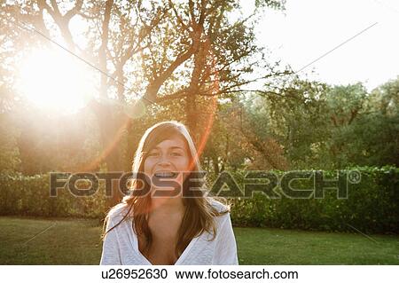 Teen in the garden View Large Photo Image Stock Image - Teen in the garden. Fotosearch