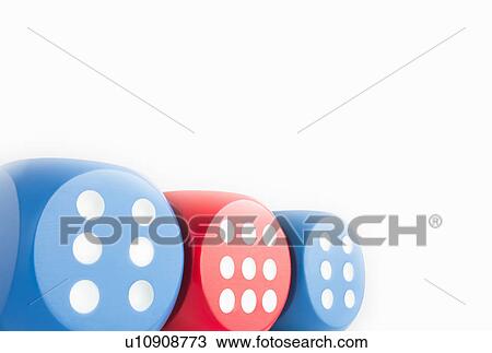 Stock Image - Three dice with one showing nine. Fotosearch