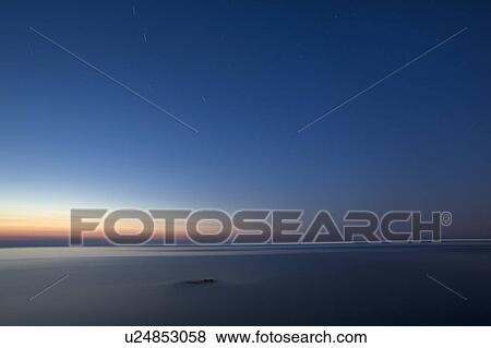 Stock Photo - Tuscan sea at dusk. Fotosearch