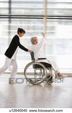 Wheel chair race View Large Photo Image Stock Image - Wheel chair race. Fotosearch