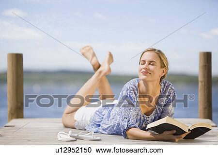 Woman at a lake View Large Photo Image Stock Image - Woman at a lake. Fotosearch