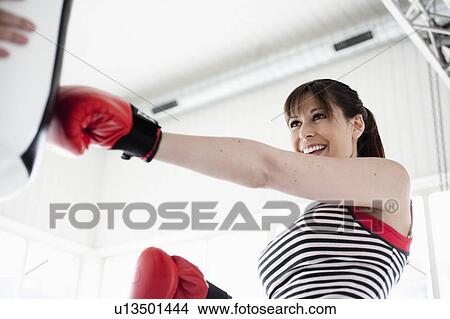 Woman boxing View Large Photo Image Picture - Woman boxing. Fotosearch