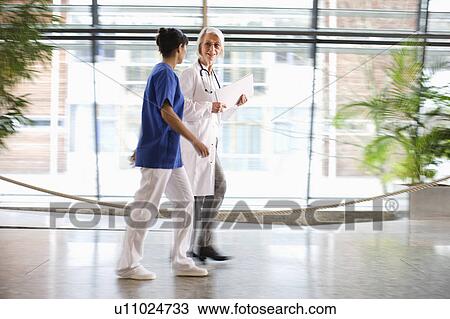 Woman doctor and nurse View Large Photo Image Stock Image - Woman doctor and nurse. Fotosearch