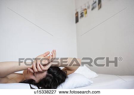 Woman in bed View Large Photo Image Stock Photo - Woman in bed. Fotosearch