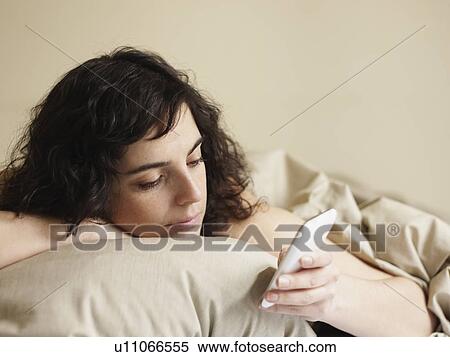 Woman in bed View Large Photo Image Stock Photography - Woman in bed. Fotosearch