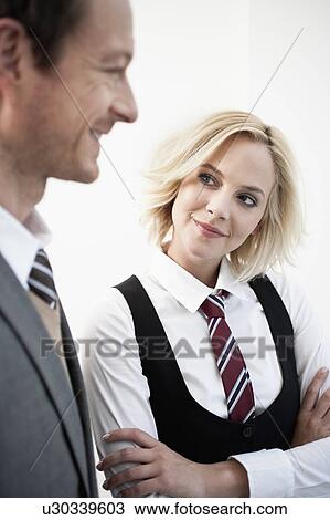 Woman looking at man View Large Photo Image Stock Image - Woman looking at man. Fotosearch