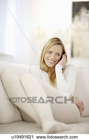 Stock Image - woman making a phone call. Fotosearch