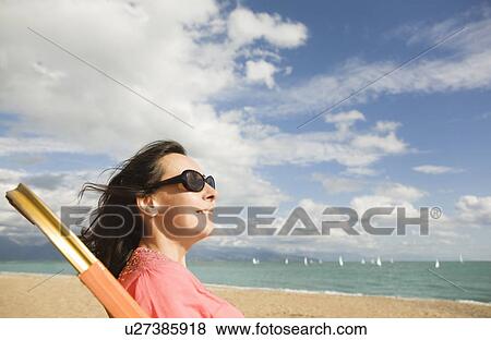 Stock Photo - Woman on Deckchair. Fotosearch