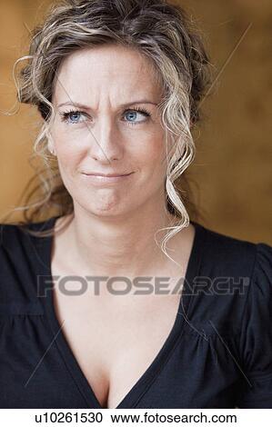Woman pulling a face View Large Photo Image Stock Image - Woman pulling a face. Fotosearch