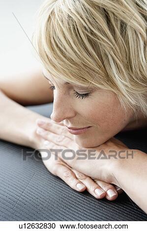 Woman relaxing View Large Photo Image Stock Image - Woman relaxing. Fotosearch