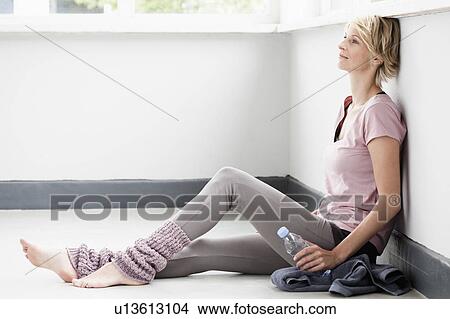 Woman resting after sports View Large Photo Image Picture - Woman resting after sports. Fotosearch