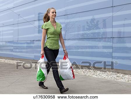 Stock Photo - Woman shopping. Fotosearch