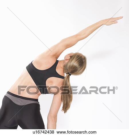 Stock Photo - woman stretching. Fotosearch