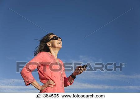 Woman Using Phone View Large Photo Image Stock Photography - Woman Using Phone. Fotosearch