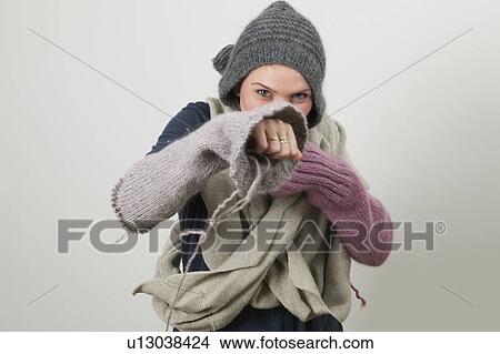 Picture - Woman wearing knitting boxing. Fotosearch
