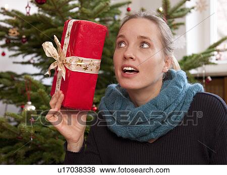 woman with christmas present View Large Photo Image Stock Photo - woman with christmas present. Fotosearch