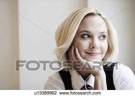 Woman with earphones View Large Photo Image Stock Image - Woman with earphones. Fotosearch