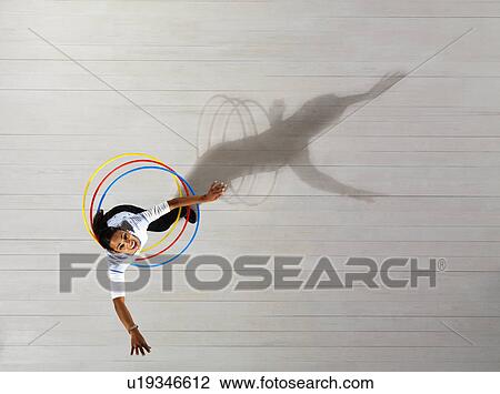Woman with hula hoops View Large Photo Image Stock Image - Woman with hula hoops. Fotosearch
